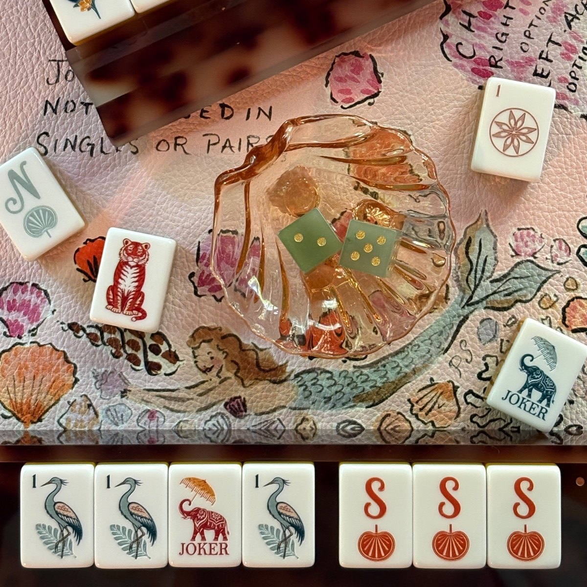 Dice dish is vintage.