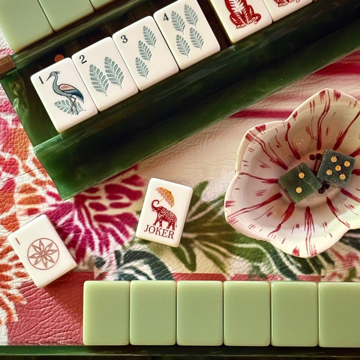 Dice dish is vintage majolica.