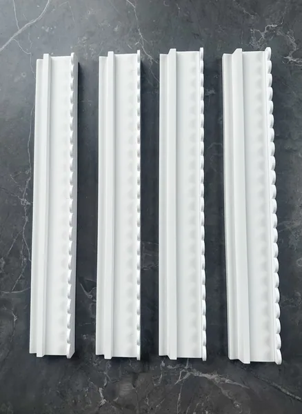 White Wooden Racks with Scalloped Pushers
