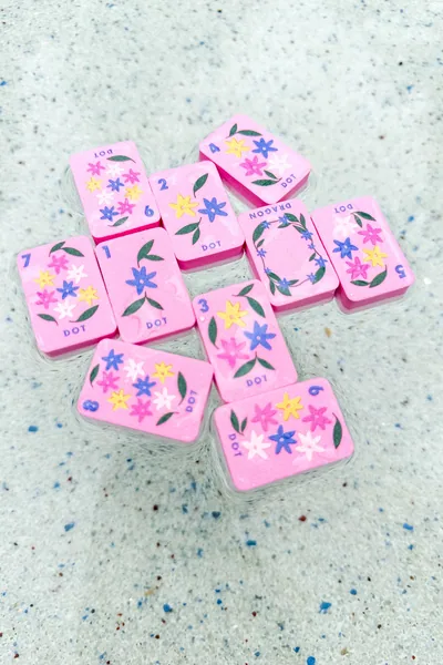 Floating Mahjong Tiles in Floral Pink for the Pool